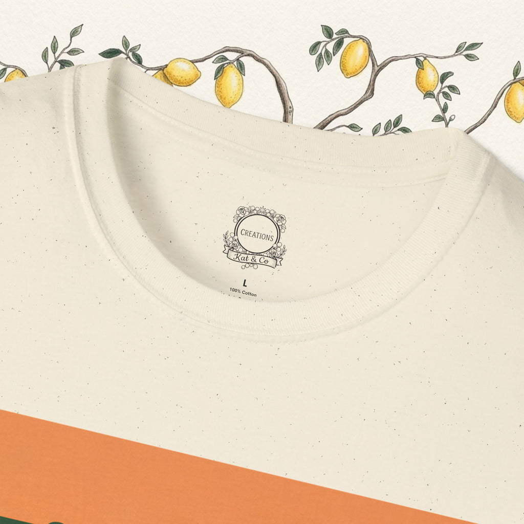 Cream T-shirt back with small neck label and stitched neckline