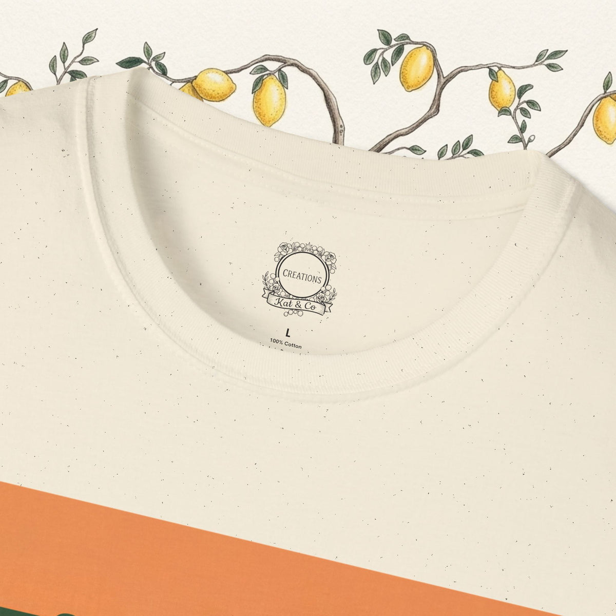Cream T-shirt back with small neck label and stitched neckline