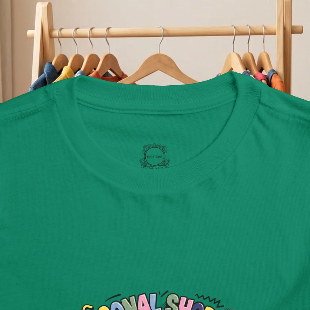 Toddler green t-shirt close-up of round neckline and small chest logo