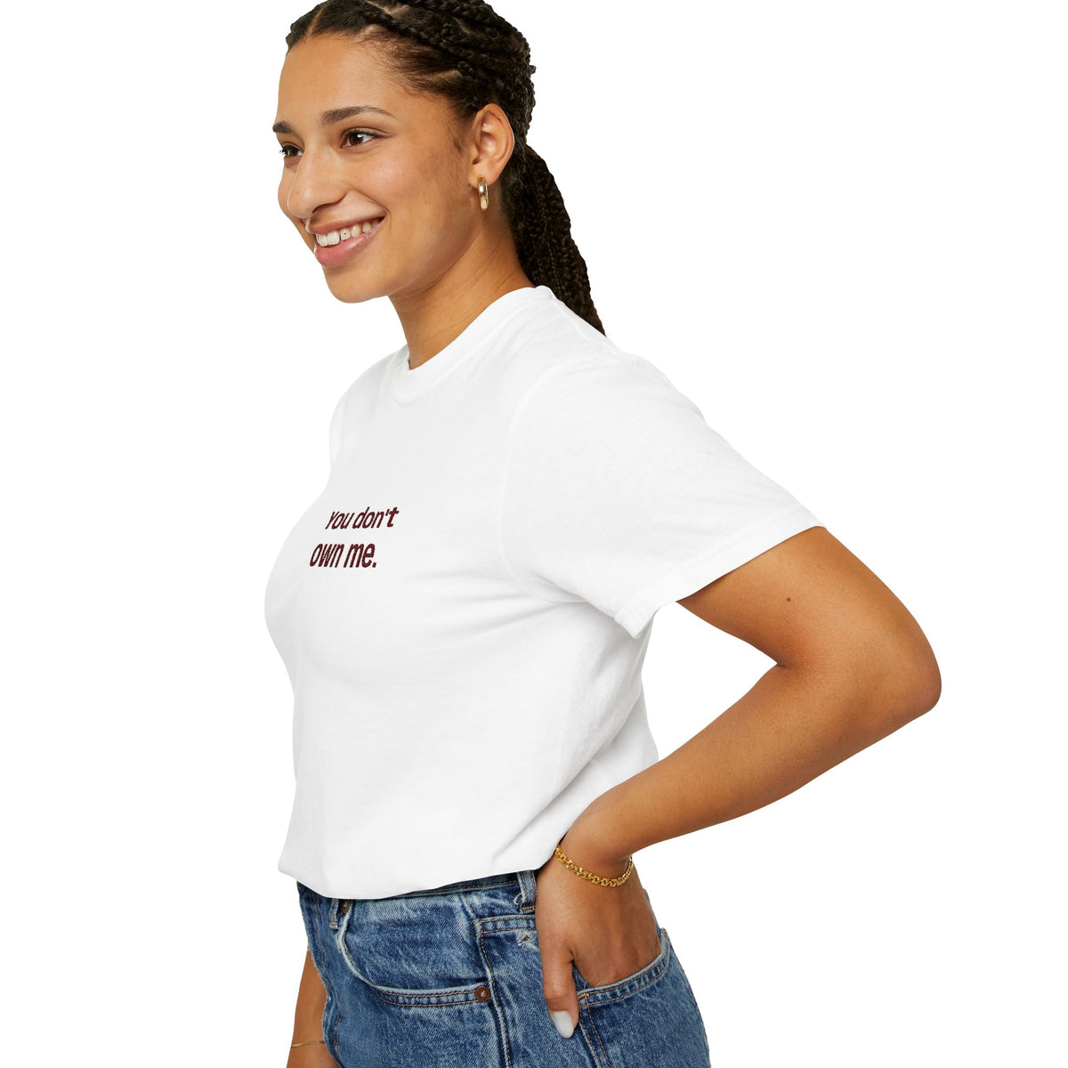 White women's T-shirt with red 'own me' text on left chest, side view