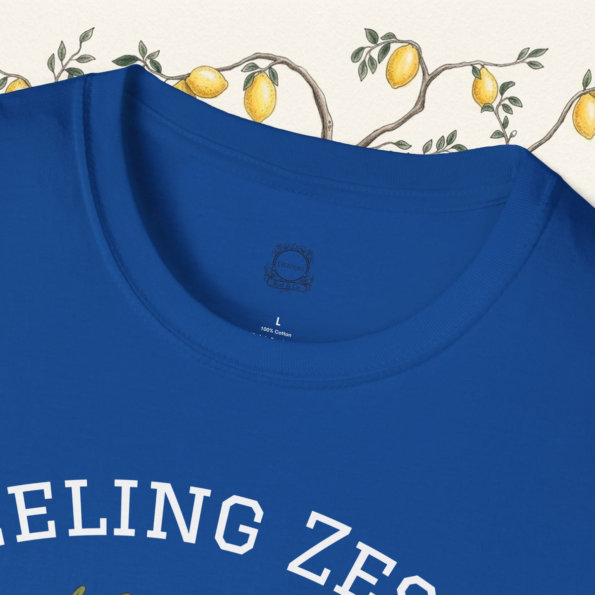 Blue crewneck t-shirt with lemon-themed text across chest