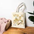 Natural canvas tote bag with zesty lemon citrus illustration and short top handles