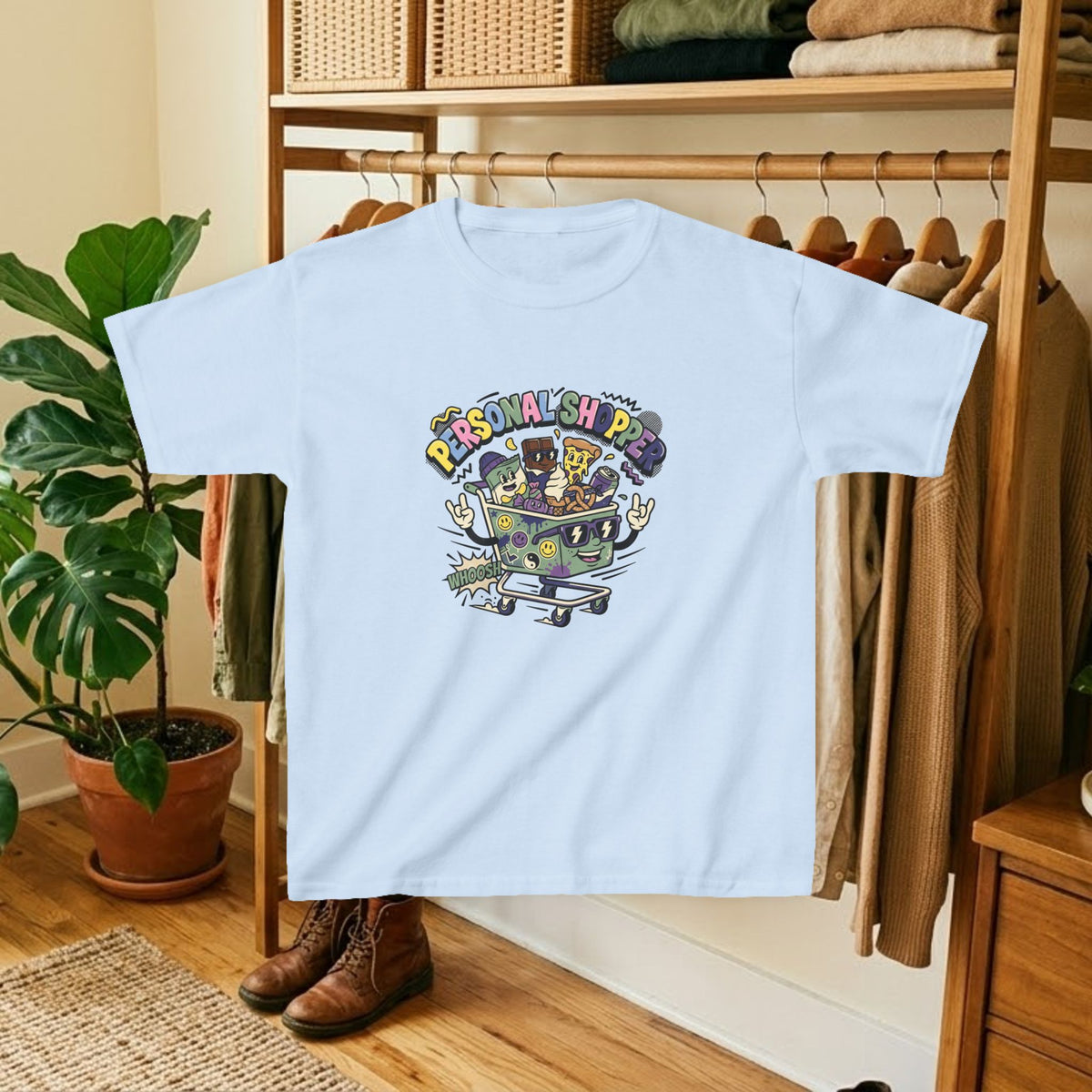 Kids light blue crewneck graphic tee with colorful shopping-cart and “Personal Shopper” design