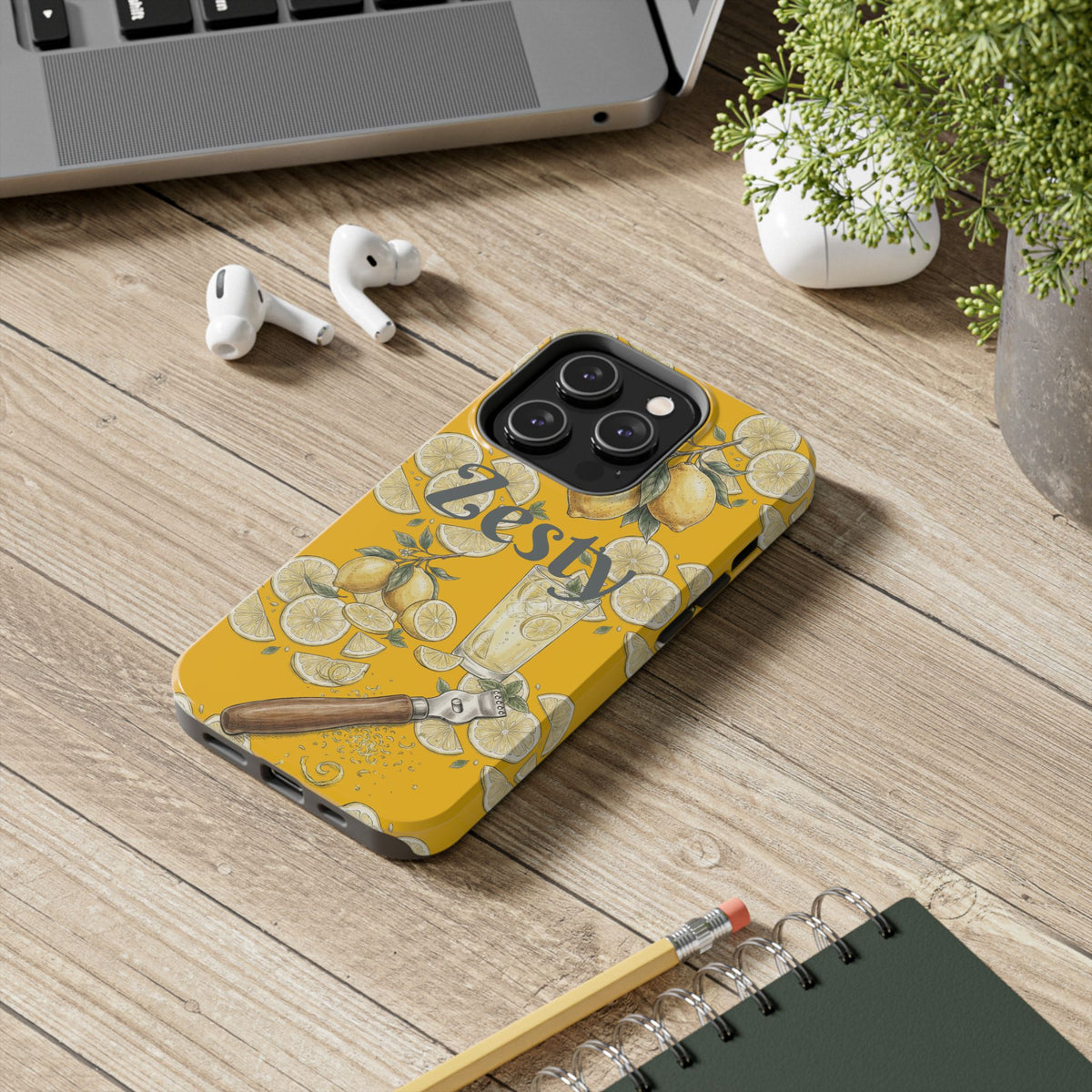 Tilted yellow citrus illustrated tough phone case with raised camera cutout.