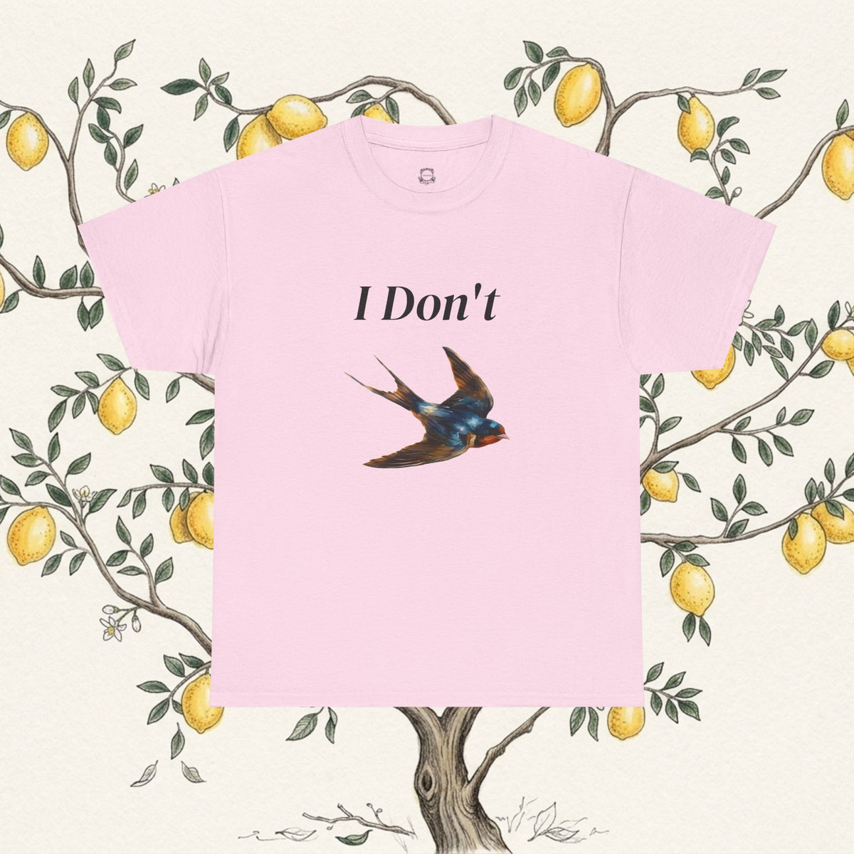 Light pink T-shirt with 'I Don't' text and swallow bird illustration.