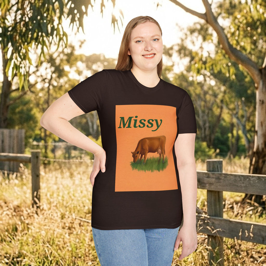 Dark brown cow graphic T-shirt with orange square print, outdoors portrait view