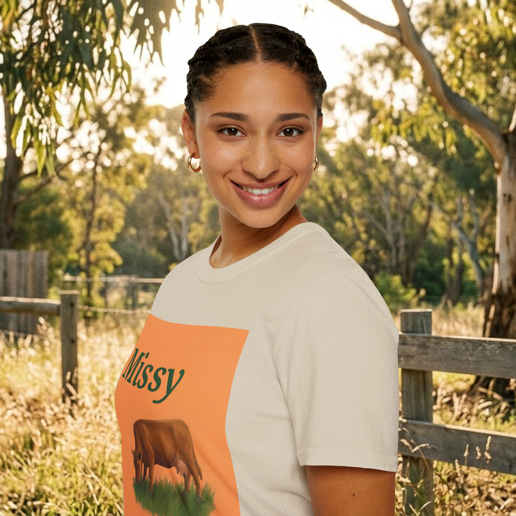 Cream short-sleeve T-shirt with orange 'Missy' script square and grazing cow