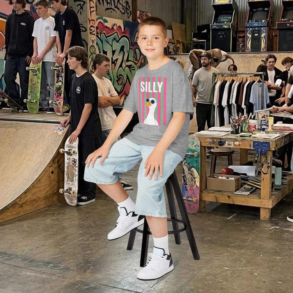 Kids heather gray t-shirt featuring a “SILLY” duck graphic; short sleeves