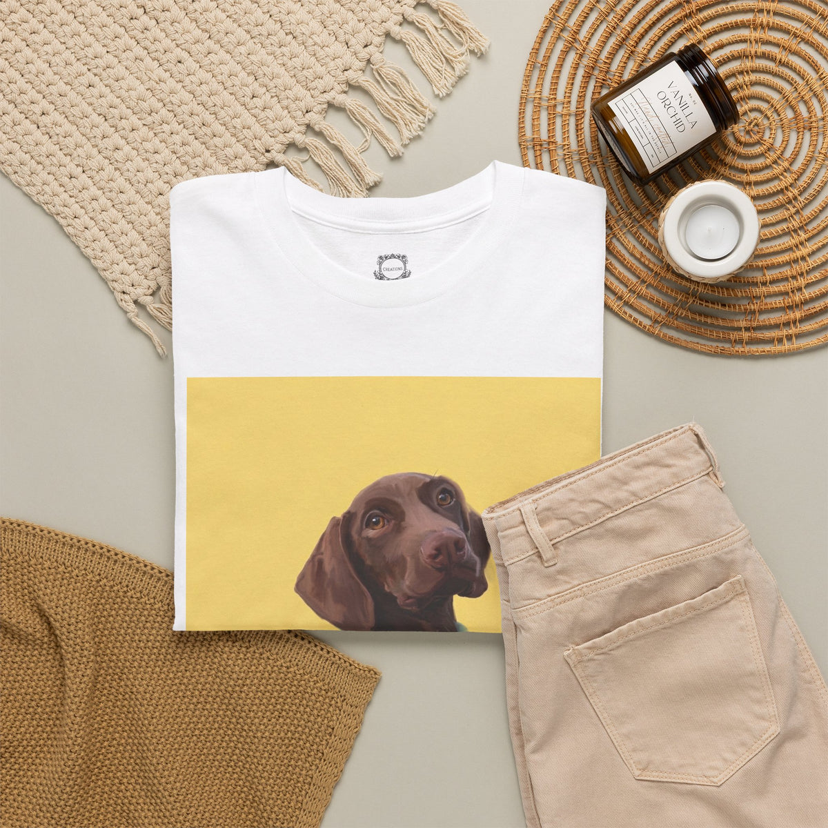 White pet t-shirt with dog portrait graphic in a yellow square panel