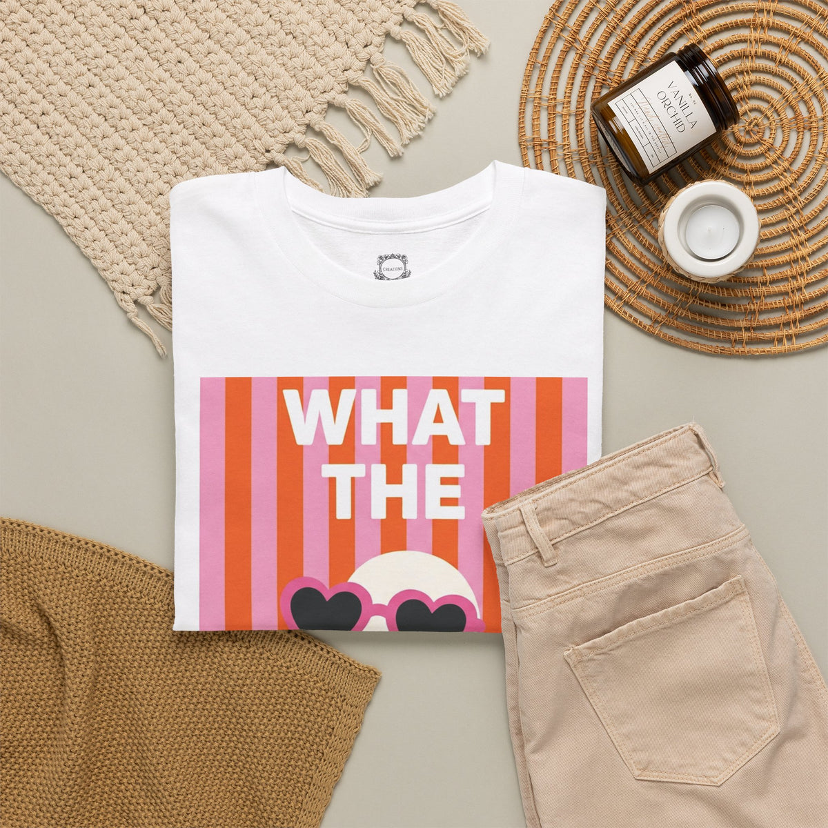 White cotton graphic tee with 'WHAT THE' retro heart sunglasses print