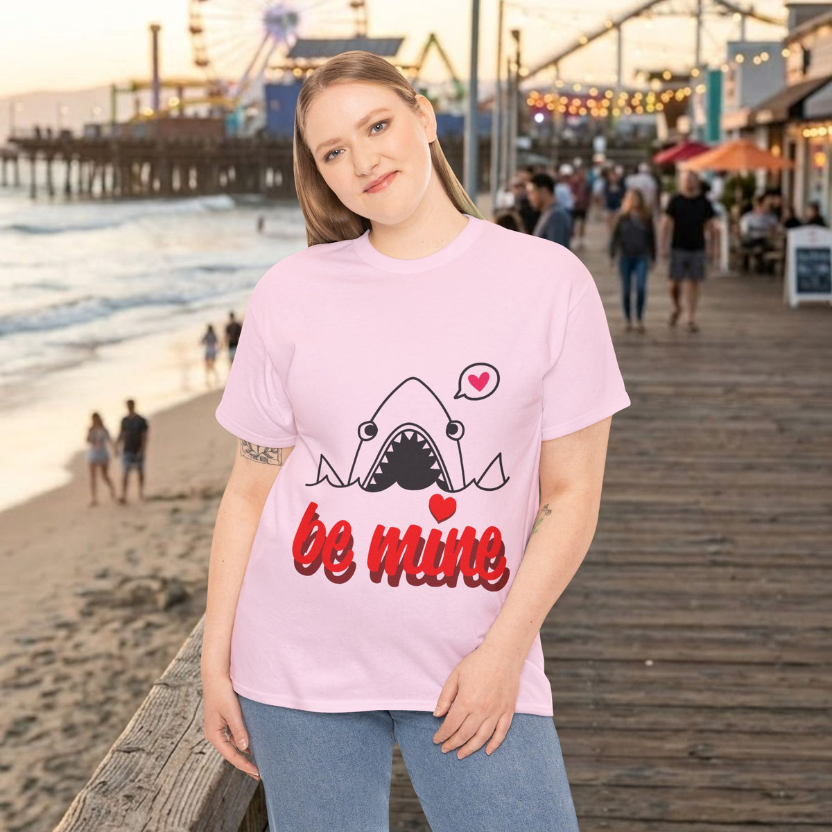 Light pink graphic shark T-shirt with 'be mine' heart print, worn by model