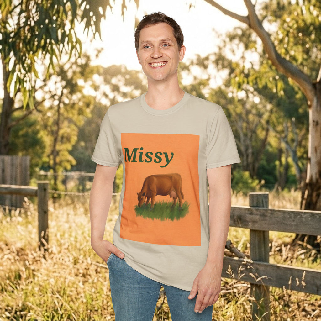 Light cream T-shirt featuring orange 'Missy' square and grazing cow graphic