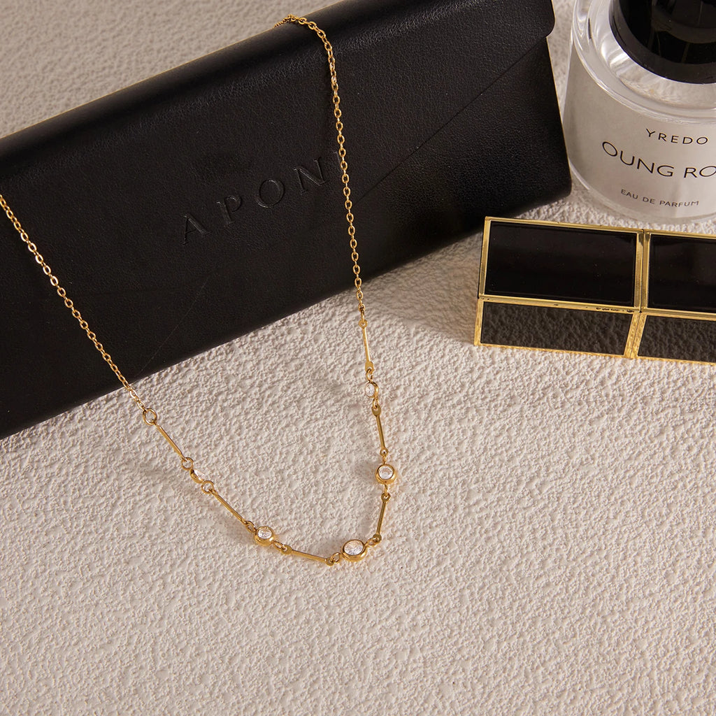 Gold layered zircon necklace by Kat&Co.