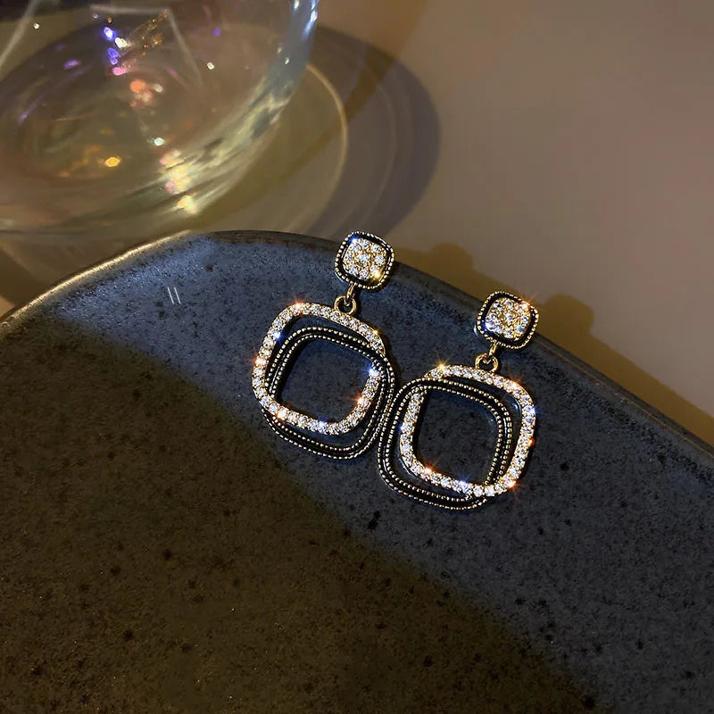 Faux gem tassel drop earrings by Kat&Co.