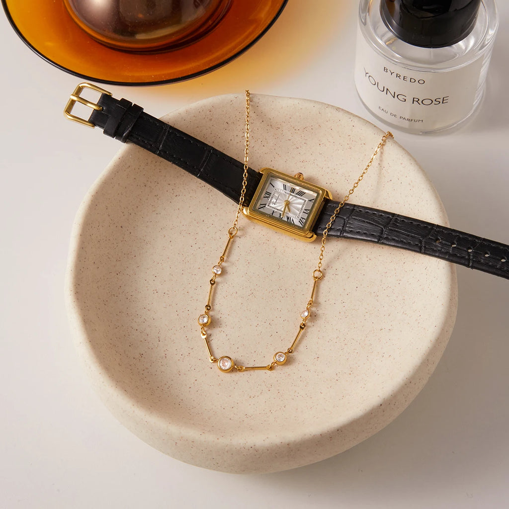 Gold layered zircon necklace by Kat&Co.