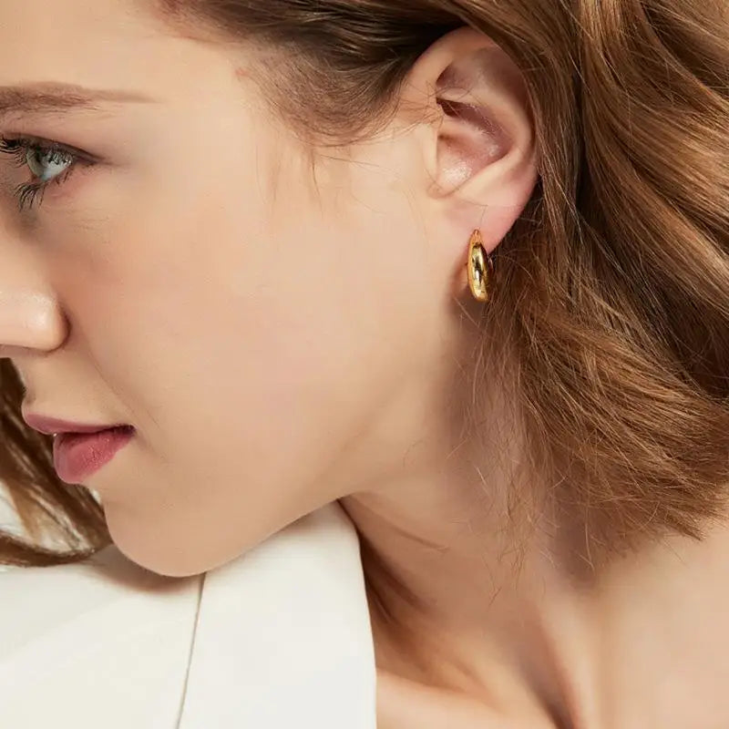 Small chunky round hoop earrings in gold or silver by Kat&Co.