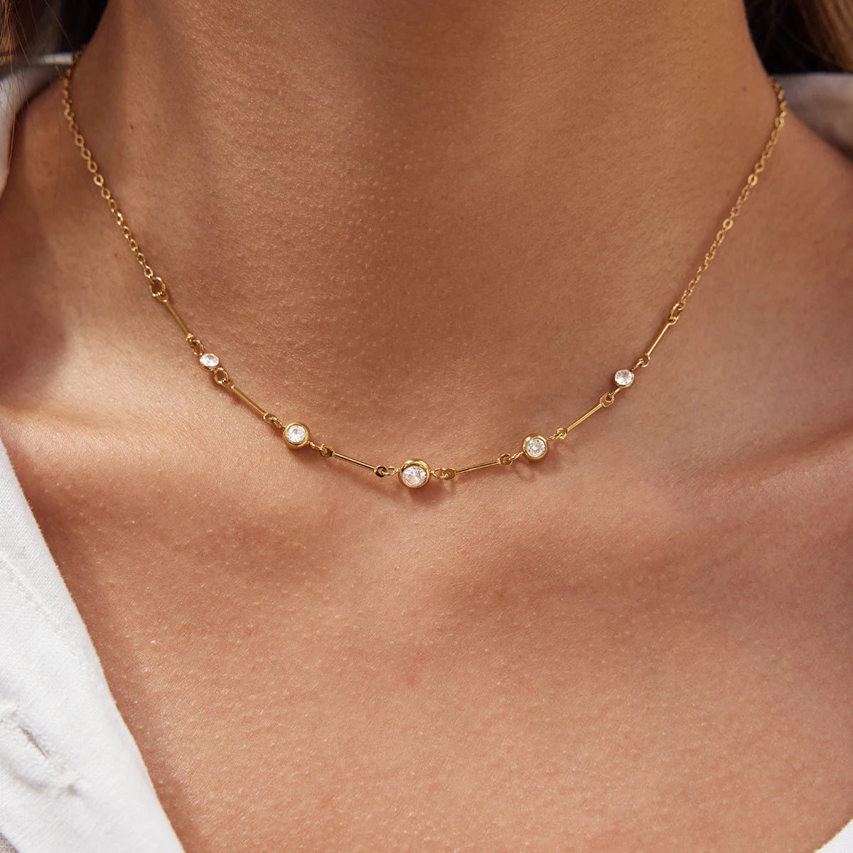 Gold layered zircon necklace by Kat&Co.