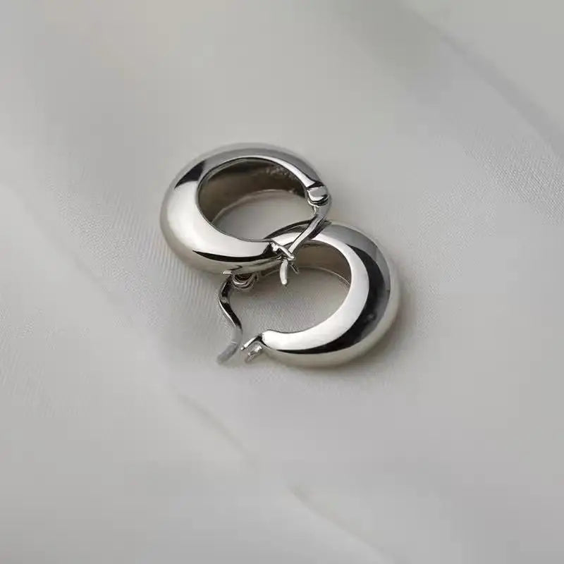 Small chunky round hoop earrings in gold or silver by Kat&Co.