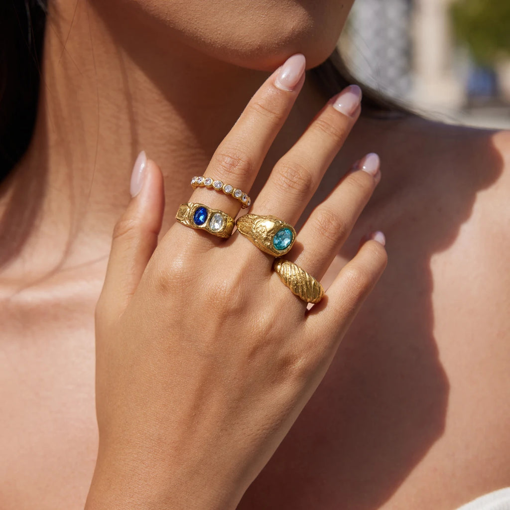 Gold chunky ring with blue crystal by Kat&Co.