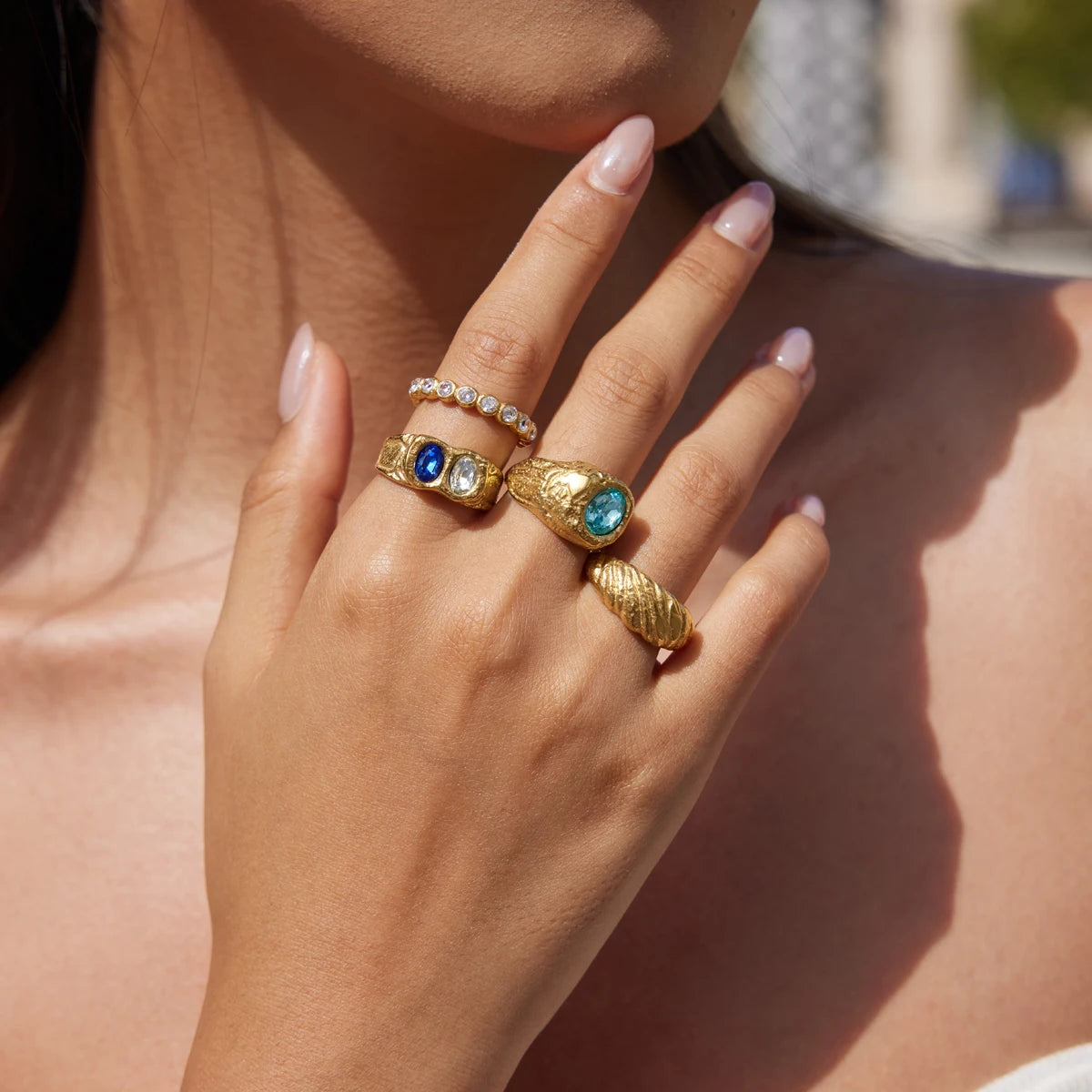 Gold chunky ring with blue crystal by Kat&Co.