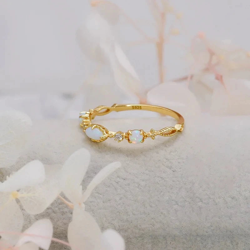 Blue apatite gemstone ring in gold plated sterling silver