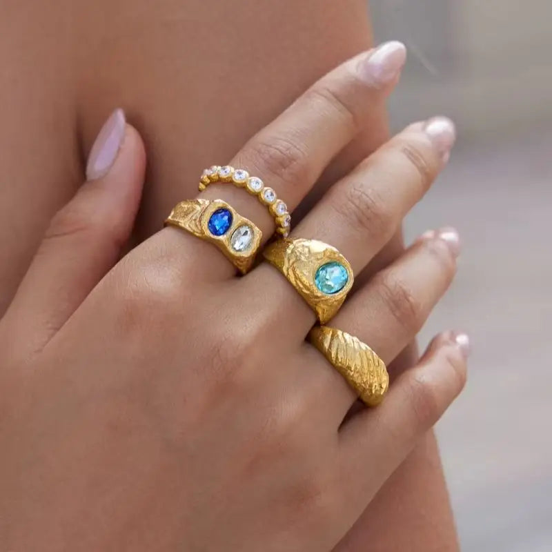 Gold chunky ring with blue crystal by Kat&Co.