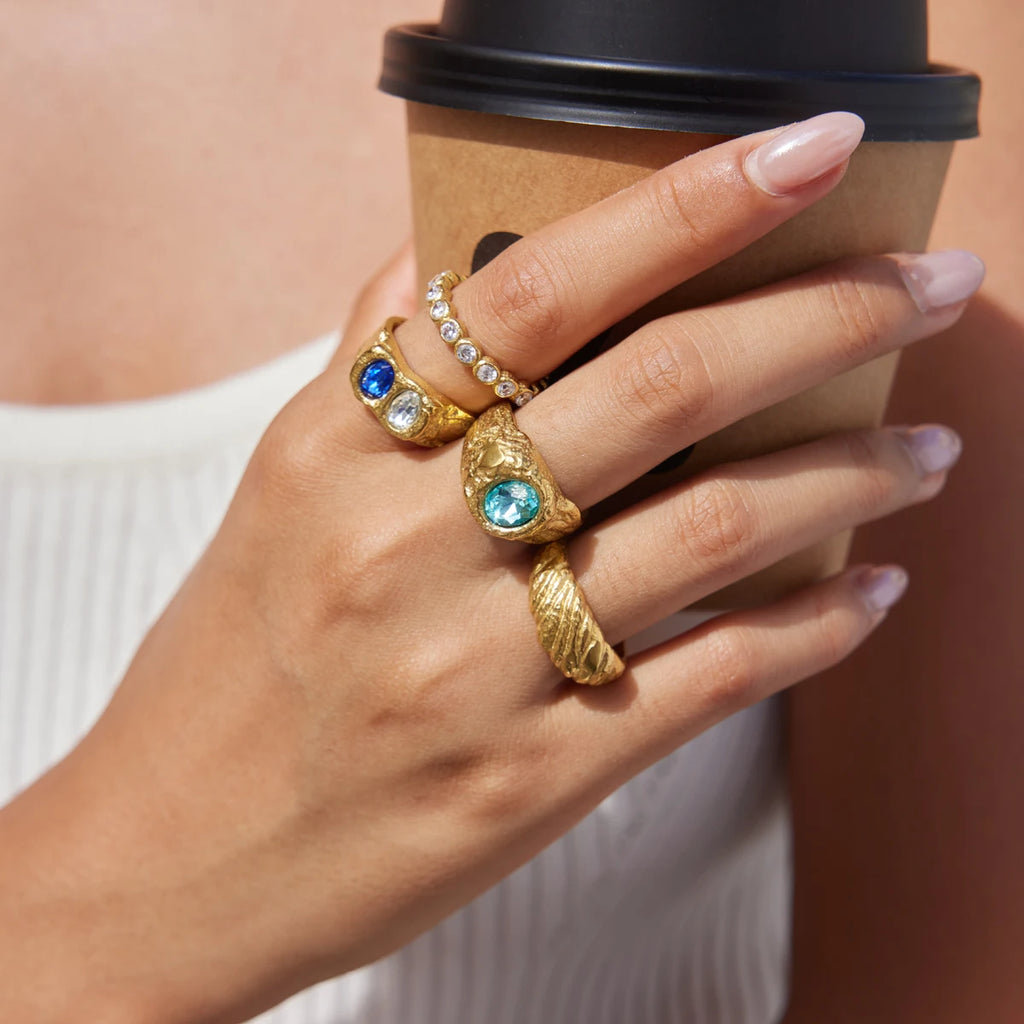 Gold chunky ring with blue crystal by Kat&Co.
