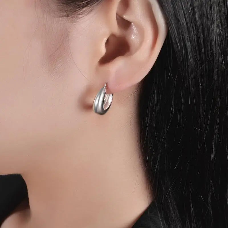 Small chunky round hoop earrings in gold or silver by Kat&Co.