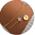 Gold clover initial bracelet with cubic zirconia by Kat&Co.